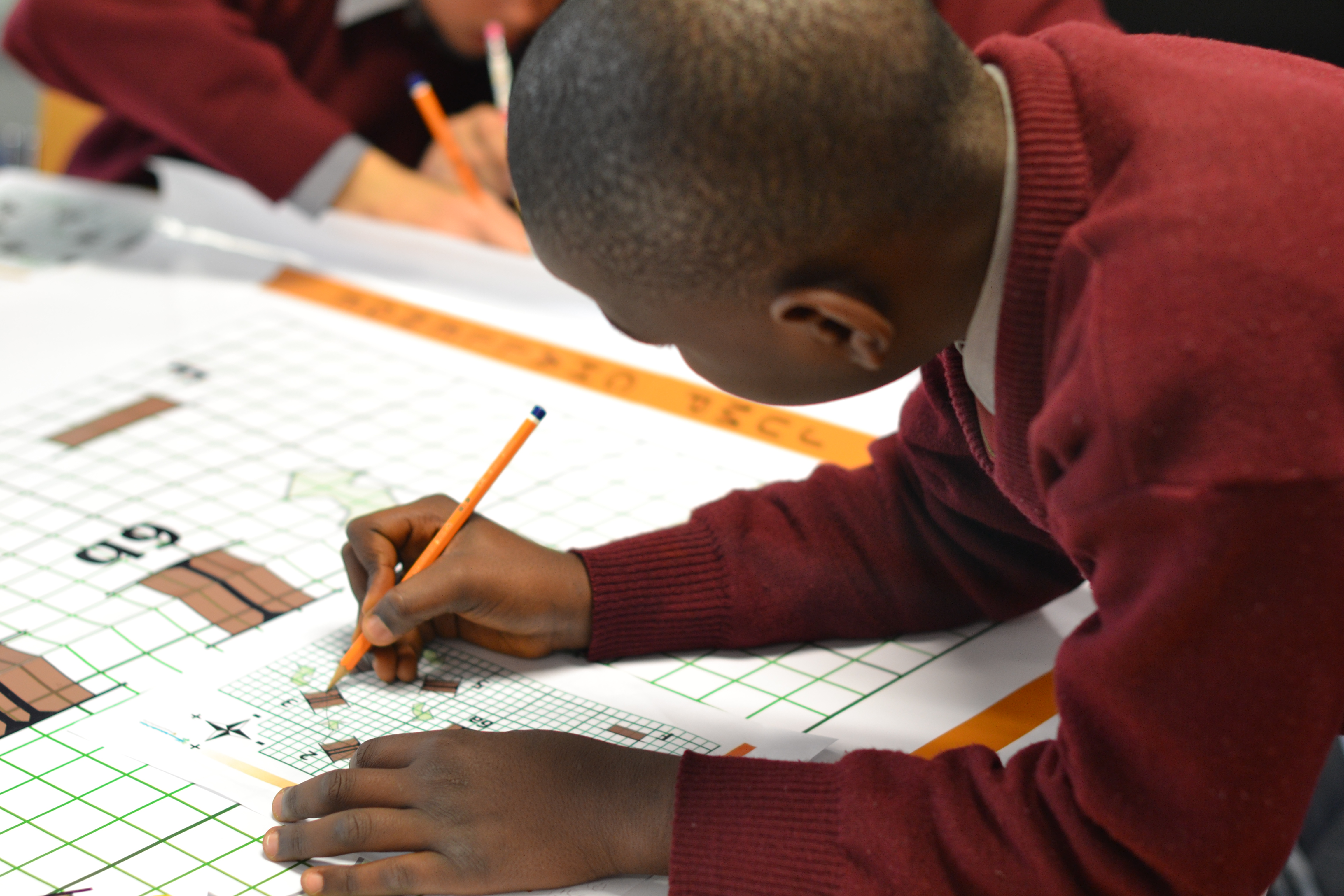 A boy at a Millennium Mathematics Project event