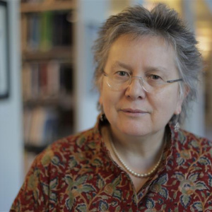 Photograph of Professor Loraine Gelsthorpe, wearing a red patterned blouse.