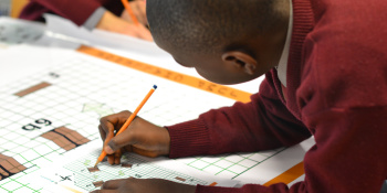 A boy at a Millennium Mathematics Project event