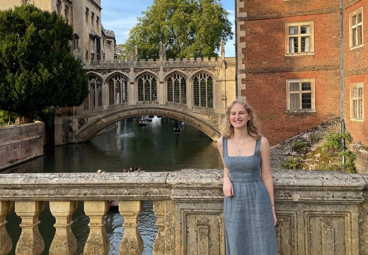 Hannah stands with the Bridge of Sighs in the background