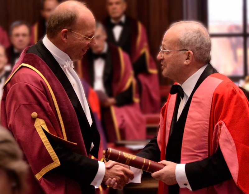 Gifford Combs is shown at his admittance to the Guild of Benefactors