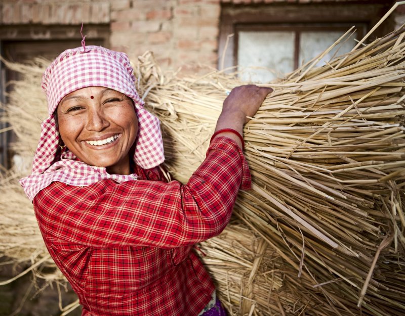 Nepali woman with crops