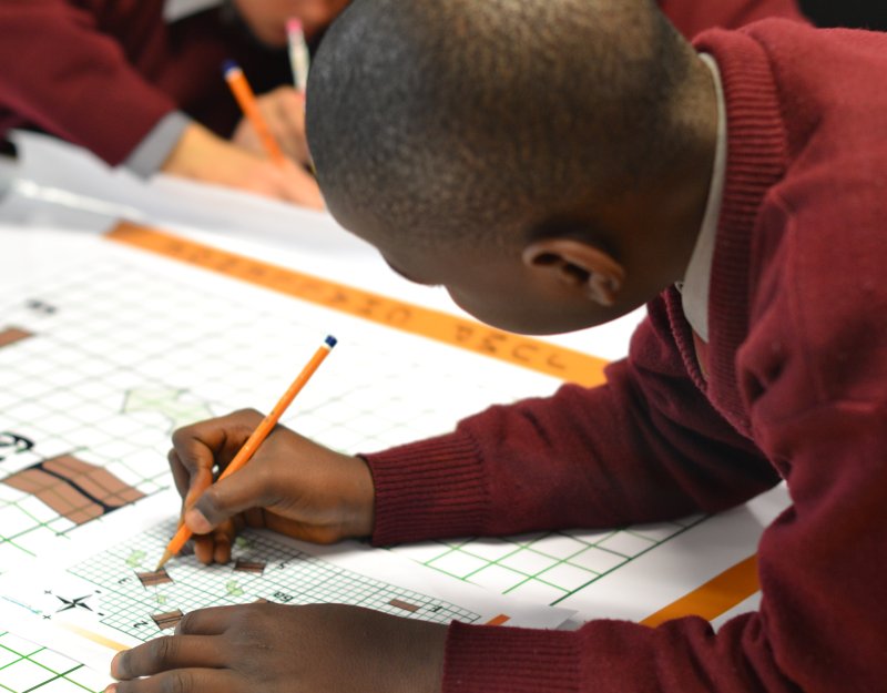 A boy at a Millennium Mathematics Project event