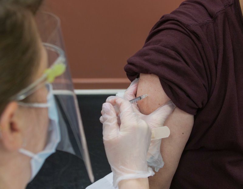 Patient receiving a COVID-19 vaccination