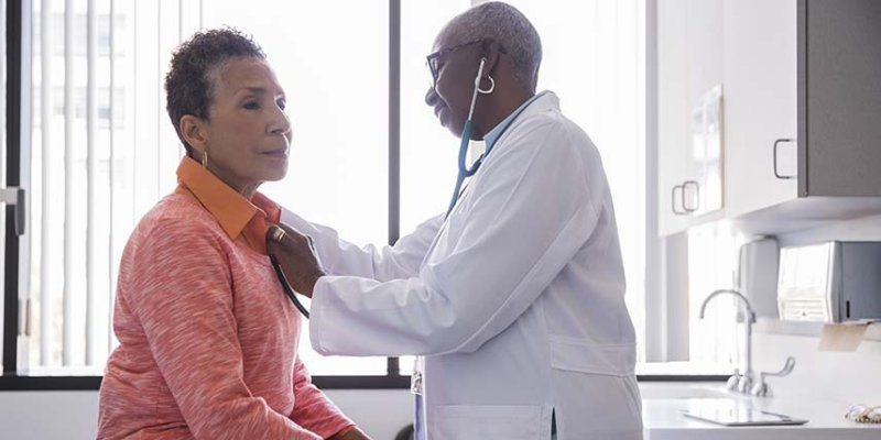 Doctor examining a patient