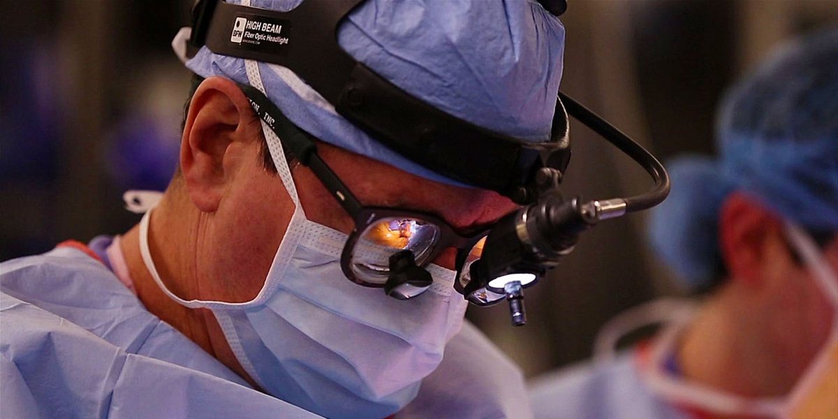 Surgeon undertaking a medical procedure on the heart