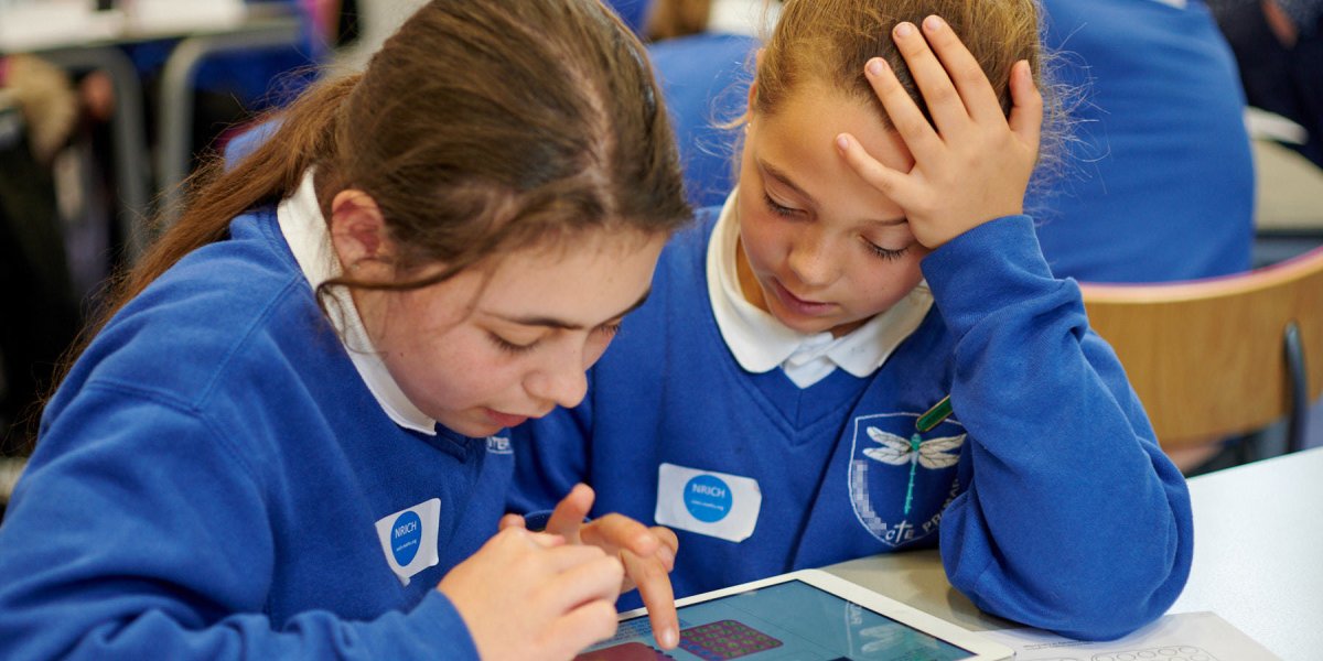 Children completing an online maths activity