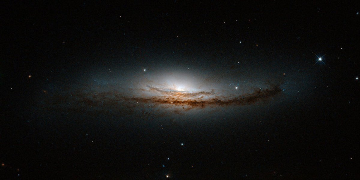 'Hubble peers at the heart of a spiral galaxy' shows NGC 5793, over 150 million light-years away in the constellation of Libra