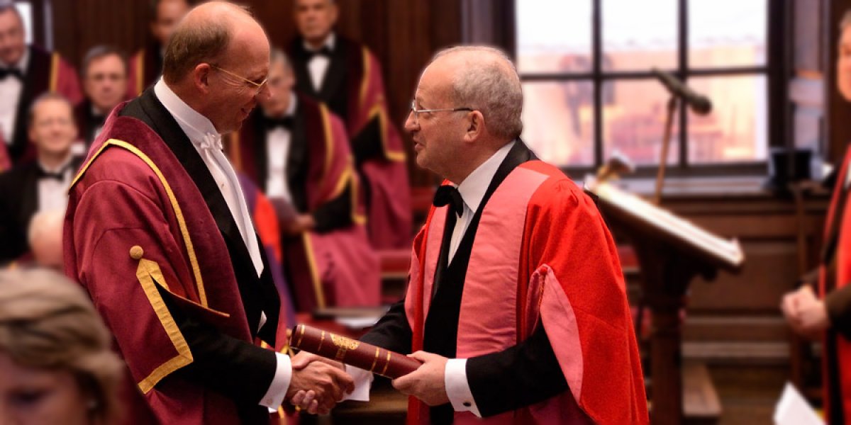 Gifford Combs is shown at his admittance to the Guild of Benefactors