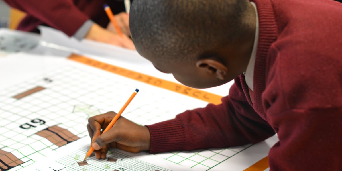A boy at a Millennium Mathematics Project event